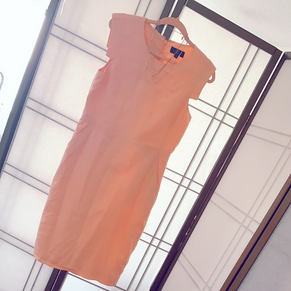 A bodycon linen Jcrew dress